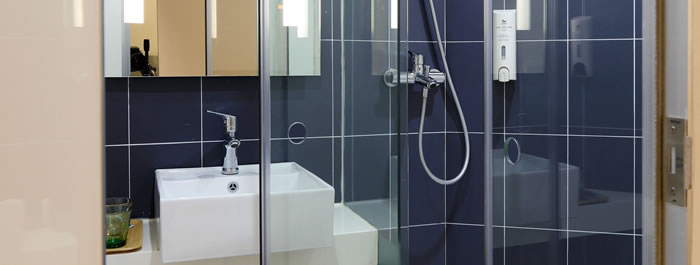 Vidriería Cedritos Bogotá. Venta, instalación de vidrios, espejos, ventanería, ventanas termoacústicas antirruido, marquetería aluminios, marquesinas, divisiones para baños.
